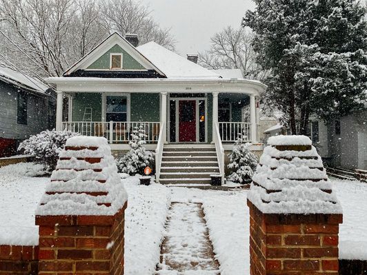 exterior of a home with snow on the ground
